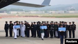 Lễ chuyển giao hài cốt tại Căn cứ Osan ở thành phố Pyeongtaek, Hàn Quốc, 27/7/2018. 