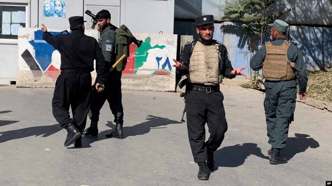 Afghan police arrive at the site of an attack at Kabul University in Kabul, Afghanistan, Monday, Nov. 2, 2020. Gunfire erupted at the university in the Afghan capital early Monday and police have surrounded the sprawling campus, authorities said. …