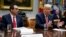 Treasury Secretary Steve Mnuchin listens as President Donald Trump speaks during a meeting on tax policy with business leaders in the Roosevelt Room of the White House, Tuesday, Oct. 31, 2017, in Washington. 