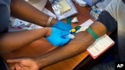 Vakcinisanje stanovnika Soveta, siromašnog predgrađa Johanesburga