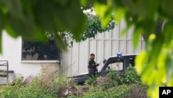 FILE - Police guard the Argentine Embassy in Caracas, Venezuela, Sept. 7, 2024.