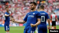 Le joueur de Chelsea Alvaro Morata fête son deuxième but, à Londres, le 22 avril 2018.