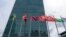 FILE - Some of the member state flags fly outside the United Nations headquarters, in New York, Sept. 18, 2020. 