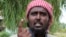 Al Shabaab spokesman Sheikh Ali Mohamud Rage addresses a news conference outside Somalia's capital Mogadishu, (File photo).