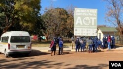 FILE - Zimbabwe authorities have maintained a heavy police presence to thwart any possible anti-government protests during the mandated COVID 19 lockdown, in Harare, July 22, 2020.