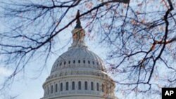 The U.S. Capitol building is seen Saturday, Nov., 19, 2011, in Washington. The six Democrats and six Republicans of the Joint Select Committee on Deficit Reduction, often called the Supercommittee, have until next Wednesday, Nov. 23, to come together on a