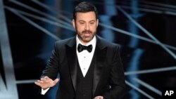 FILE - Host Jimmy Kimmel speaks at the Oscars at the Dolby Theatre in Los Angeles, Feb. 26, 2017. 