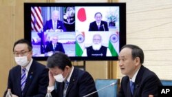 Japan's Prime Minister Yoshihide Suga speaks during the virtual summit of the leaders of Australia, India, Japan and the U.S., a group known as “the Quad", at his official residence in Tokyo, Japan, March 12, 2021.