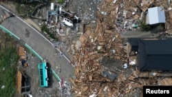 A view shows damages after floods caused by torrential rain, in Kumamura, Kumamoto Prefecture, southwestern Japan, July 8, 2020.