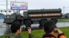 Russian S-400 surface-to-air missile launchers take part in a second night of rehearsals for the WWII Victory Parade in Moscow on June 18, 2020.