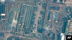 This satellite images provided by Maxar Technologies shows troops gathered at Bakhchysarai, Crimea. Feb. 1, 2022.
