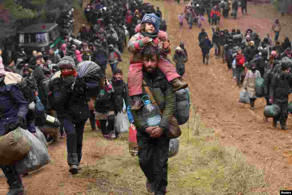 Migrants attempt to cross the Belarusian-Polish border at the Bruzgi-Kuznica Bialostocka border crossing, Belarus.