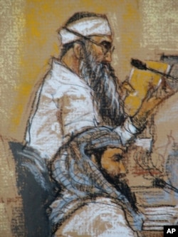 FILE - In this Jan. 21, 2009, photograph  of a sketch by tribunal  creator  Janet Hamlin, Walid bin Attash, bottom, and Khalid Sheik Mohammad be  a proceeding  astatine  the U.S. Military Commissions tribunal  for warfare  crimes astatine  the U.S. Naval Base successful  Guantanamo Bay, Cuba.