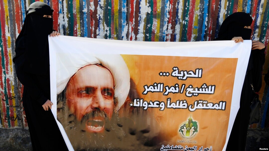 Shia ulamo Nimr al-Nimr suratini ko'targan namoyishchilar, 2014-yilda olingan surat