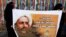 Shia ulamo Nimr al-Nimr suratini ko'targan namoyishchilar, 2014-yilda olingan surat
