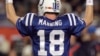 FILE - In this Feb. 7, 2010, file photo, Indianapolis Colts quarterback Peyton Manning celebrates after teammate Joseph Addai scored a touchdown during the second half of the NFL Super Bowl XLIV football game against the New Orleans Saints in Miami.