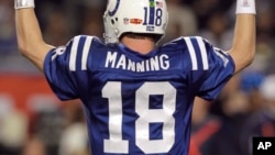 FILE - In this Feb. 7, 2010, file photo, Indianapolis Colts quarterback Peyton Manning celebrates after teammate Joseph Addai scored a touchdown during the second half of the NFL Super Bowl XLIV football game against the New Orleans Saints in Miami.