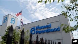 FILE - A Planned Parenthood clinic is seen June 4, 2019, in St. Louis. A Missouri commissioner on June 28, 2019, ruled that the state's only abortion clinic can continue providing the service at least until August as a fight over its license plays out.