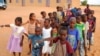 FILE - Children get ready to enter a class room in Yakouta, Burkina Faso. 