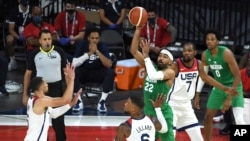 Nigeria's Gabe Nnamdi Vincent (22) looks to pass against the United States during an exhibition basketball game on July 10, 2021, in Las Vegas.