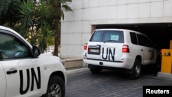 Ðoàn xe của các chuyên gia của Tổ chức Cấm Vũ khí hóa học OPCW băng biên giới từ Libăng sang Syria, ngày 1/10/2013.