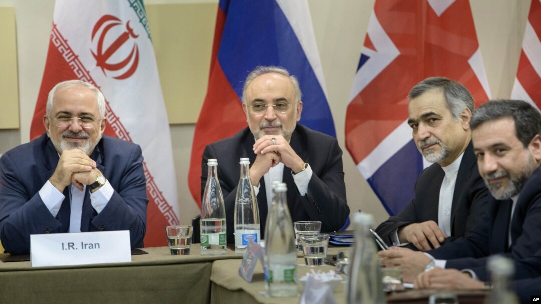 Iranian Foreign Minister Javad Zarif, left, Head of Iranian Atomic Energy Organization Ali Akbar Salehi, second left, Special Assistant to Iranian president Hossein Fereydoun, second right, and Iranian Deputy Foreign Minister Abbas Araghchi at the nuclear talks in Switzerland, Monday, March 30, 2015. (AP Photo/Brendan Smialowski, Pool)