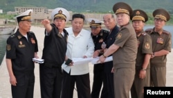 North Korean leader Kim Jong Un visits a naval base construction site at an undisclosed location in North Korea, in this photo released by North Korea's official Korean Central News Agency on Sept. 8, 2024. (KCNA via REUTERS) 