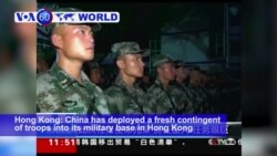 VOA60 World PM - China Rotates Fresh Troops into Hong Kong