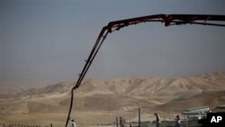 تصویر کې د شرقي یورشلم سره نزدې د یهودیانو د پاره د اباد کارۍ منظر