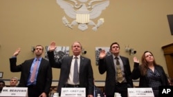 Witnesses, from left, Joel Beauvais, acting deputy assistant administrator, Office of Water, EPA; Keith Creagh, director, Department of Environmental Quality, State of Michigan; Marc Edwards, Virginia Tech professor, Environmental and Water Resources Engineering; and Flint, Michigan, resident LeeAnne Walters, are sworn in on Capitol Hill in Washington, Feb. 3, 2016, prior to testifying before the House Oversight and Government Reform Committee hearing to examine the ongoing situation in Flint, Michigan. 