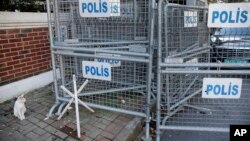 FILE - Security barriers block the road leading to Saudi Arabia's consulate in Istanbul, Turkey, Oct. 28, 2018.