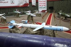 Missiles and drone aircraft are seen on display at an exhibition at an unidentified location in Yemen in this undated handout photo released by the Houthi Media Office on Sept. 17, 2019.