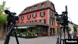 Media cameras and tripods are seen outside Le Chambard Hotel in Kaysersberg-Vignoble, France, June 8, 2018. 