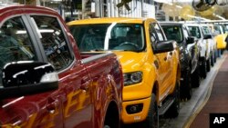 FILE - Model year 2021 Ford Ranger trucks on the assembly line at Michigan Assembly, June 14, 2021, in Wayne, Mich.