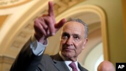 Senate Minority Leader Chuck Schumer of N.Y., points to a question during a media availability after a policy luncheon on Capitol Hill, May 8, 2018 in Washington. 