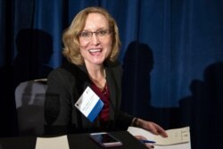 FILE - Michigan Supreme Court Justice Joan Larsen moderates a panel discussion during the Federalist Society's National Lawyers Convention in Washington, Nov. 17, 2016.
