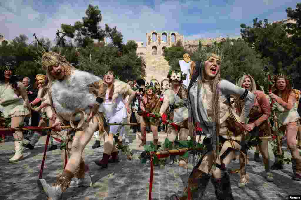 Revelers participate in &quot;Falliforia&quot; carnival, inspired by Dionysus, the Ancient Greek god of wine and festivity, in Athens, Greece.