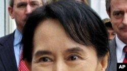 Myanmar democracy icon Aung San Suu Kyi smiles following meeting with US Assistant Secretary of State for East Asian and Pacific Affairs Kurt Campbell (not pictured) 4 Nov 2009