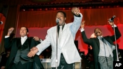 FILE - The Delfonics, from left, Randy Cain, William "Poogie" Hart, and brother Wilbert Hart, perform at the Rhythm & Blues Foundation's 14th annual Pioneer Awards in Philadelphia on June 29, 2006.