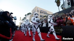 Storm troopers march in at the world premiere of the film "Star Wars: The Force Awakens" in Hollywood, California. 