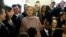 Democratic presidential candidate Hillary Clinton speaks with US Senate pages as she departs after meeting with Senate Democrats during their luncheon gathering at the U.S. Capitol in Washington, July 14, 2016. 