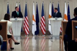 U.S. Secretary of State Mike Pompeo, left, and Cypriot President Nicos Anastasiades make statements during a press conference at the Presidential Palace in Nicosia, Cyprus, Sept. 12, 2020.