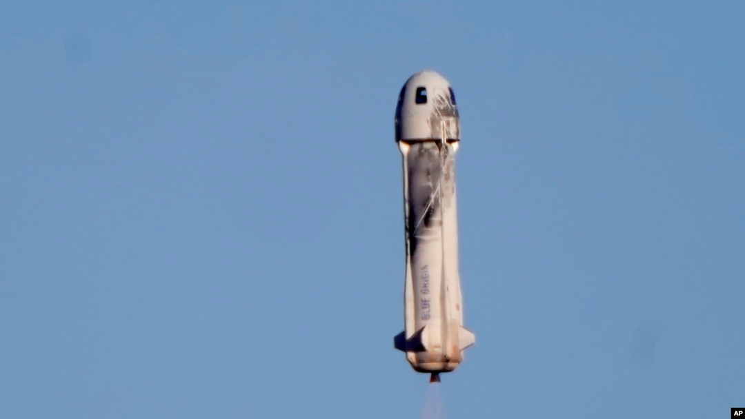 Blue Origin's New Shepard rocket launches carrying TV celebrity and former NFL football great Michael Strahan along with other passengers from its spaceport near Van Horn, Texas, Dec. 11, 2021.