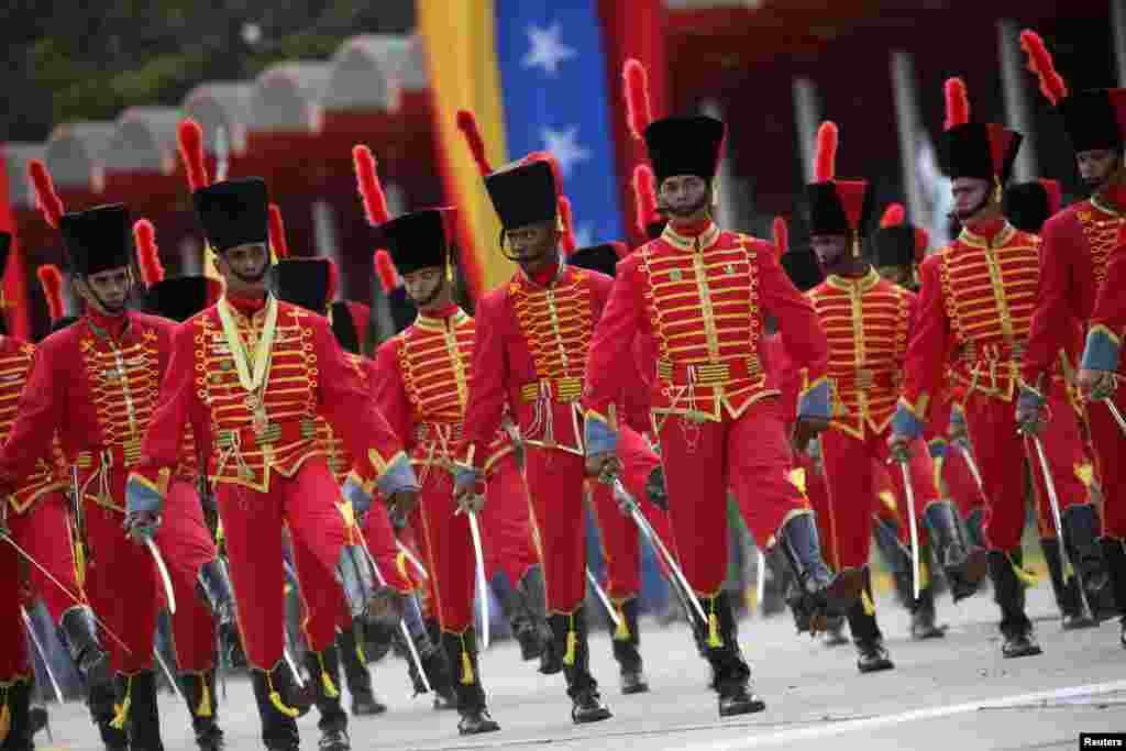 Venezuelan soldiers take part in a military parade in Caracas, Feb. 1, 2017.