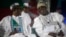 Les deux candidats, Atiku Abubakar et Mohammadu Buhari, à Lagos au Nigeria le 11 décembre 2014.