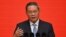 Perdana Menteri China Li Qiang menyampaikan pidatonya pada Forum Pembangunan China di Beijing pada 24 Maret 2024. (Foto: AFP)