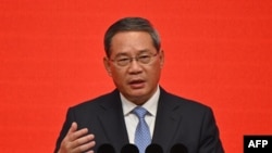 FILE - Chinese Premier Li Qiang, shown here in Beijing on March 24, 2024, will visit New Zealand this week, Prime Minister Chris Luxon said on June 10, 2024.