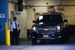 A car reportedly carrying the body of financier Jeffrey Epstein arrives at the medical examiner's office after he was found dead in his cell in the Manhattan Correctional Center of New York City, Aug. 10, 2019.