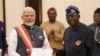 Waziri mkuu wa India Narendra Modi (kushoto) akishika hati ya medali kuu ya heshima ya Nigeria Grand Commander of the Order of the Niger (GCON) aliyokabidhiwa na rais Bola Tinubu(kushoto) hapo Novemba 17, 2024.