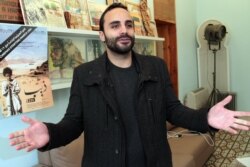 FILE - Bassel Ghandour, of Jordan's first Oscar-nominated film "Theeb," speaks during an interview with The Associated Press, in Amman, Jordan, Jan. 7, 2016.